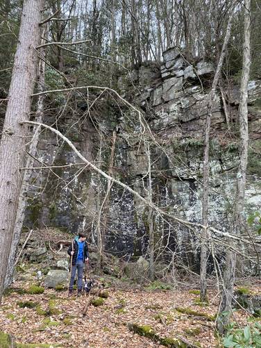 Large rock walls (30-40 feet tall) old quarry site