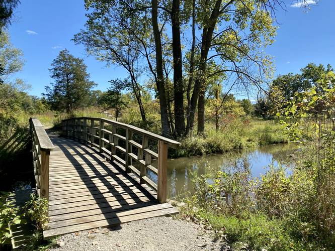 Bridge crosses over Willow Pond's stream