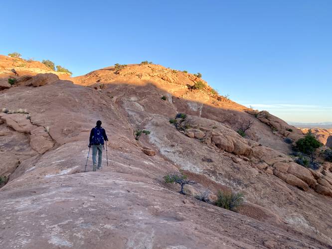 Dave hiking the bedrock to reach the 2nd Overlook at Upheaval Dome