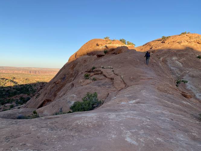 Hiking up the bedrock to reach the 2nd Overlook at Upheaval Dome